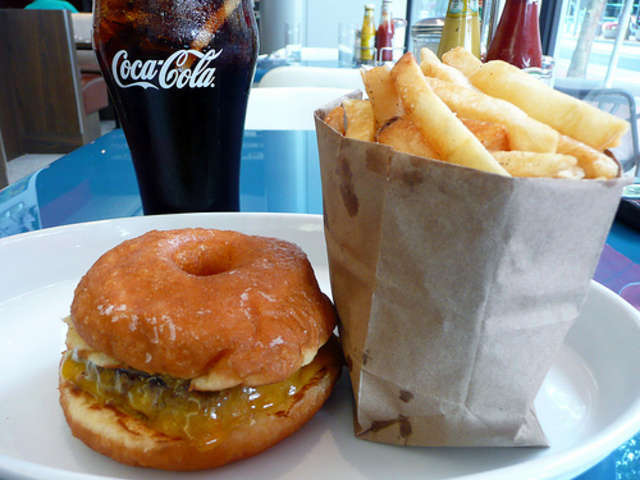 nXp7kbV2WCabjj-640m Yes, it's a donut burger! (Though, this picture was actually snatched from <a href= http://www.urbanspoon.com/r/24/1449708/restaurant/Downtown/The-Original-A-Dinerant-Portland>here</a>.)