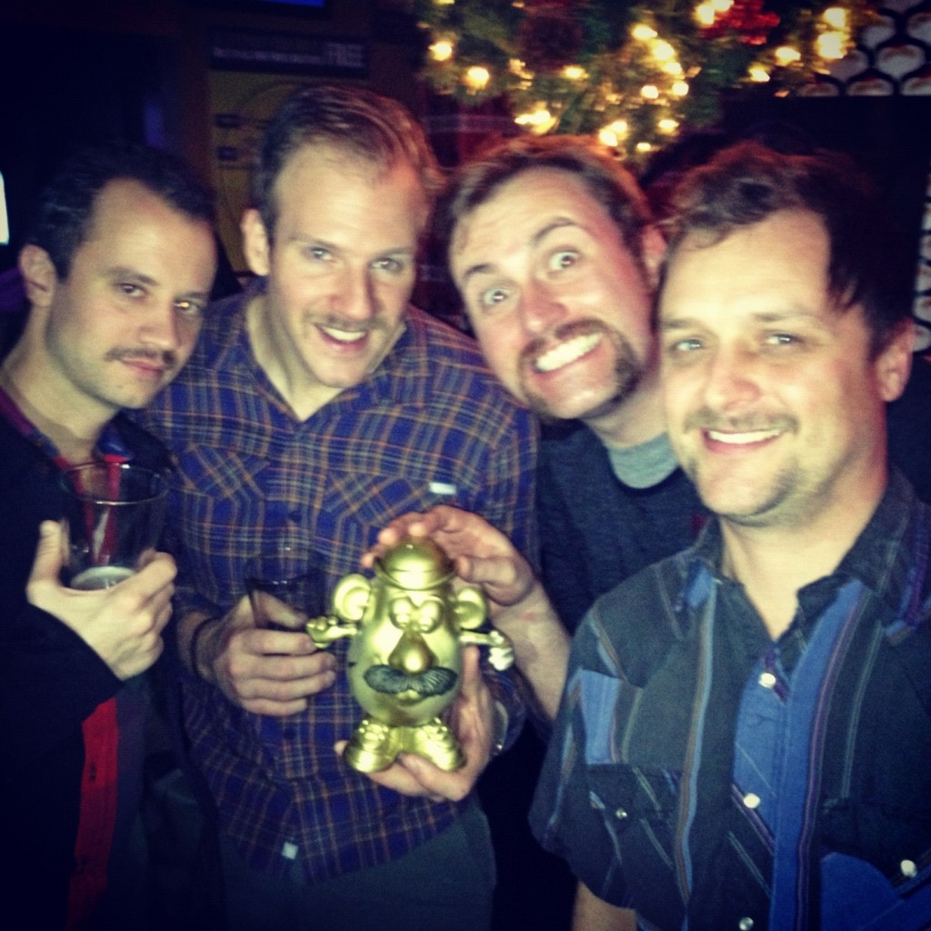 A few members of M.M.G.M. Northwest with our mustachioed prize!