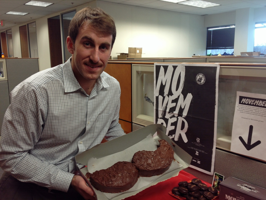Danny Gibbons with a slick mustache cake by Lexie Gibbons!